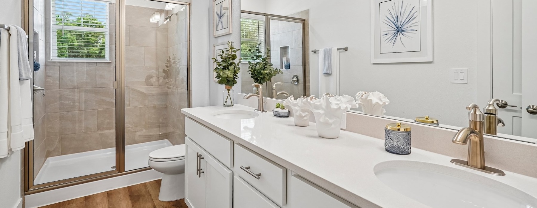 a bathroom with a tub, sink and toilet